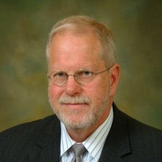 professional man smiling at camera